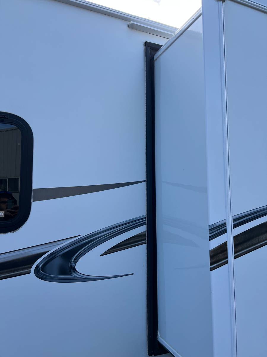 Slide-out seal and white sidewall panels with graphics, clean and glossy